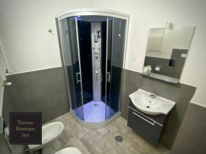 A bathroom at Terrace Boutique Inn Még 37 kép