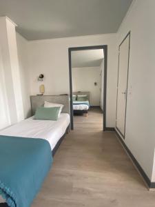 Postel nebo postele na pokoji v ubytování Boutique Hotel Lumaa Marinero