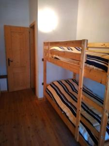 Postel nebo postele na pokoji v ubytování Maso Mandrea Barbara Apartment