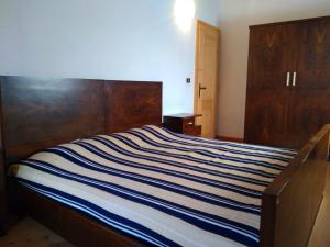 Postel nebo postele na pokoji v ubytování Maso Mandrea Barbara Apartment
