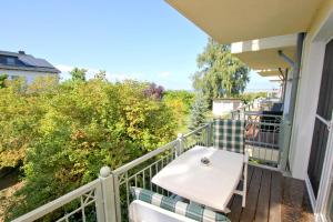 Ein Balkon oder eine Terrasse in der Unterkunft Strandvilla Böck FeWo 10 strandnah, Balkon, Meerblick
