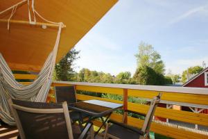 Balkón nebo terasa v ubytování strandnah,modernes Haus mit eigener Sauna, Garten, Terrasse - Ferienhaus SagaSol