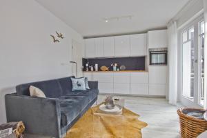 Χώρος καθιστικού στο Ferienwohnung mit Balkon und Meerblick - Ferienresidenz Zwei Bodden FeWo 1-4 +13 φωτογραφίες