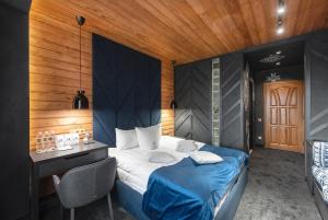 Postel nebo postele na pokoji v ubytování Stara Pravda Hotel - Vykrutasy