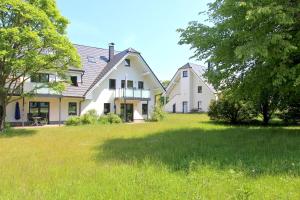Zahrada ubytování strandnahe FeWo mit Terrasse, gratis Nutzung vom AHOI Erlebnisbad und Sauna in Sellin - Rex Rugia FeWo 13-1