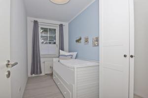 Fotografie z fotogalerie ubytování moderne Ferienwohnung mit eigener Terrasse - Haus Inselwind FeWo MEERsand v destinaci Groß Zicker