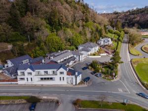 an aerial view of a large white house at Woodenbridge Hotel in Arklow