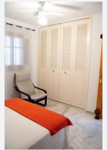 Voodi või voodid majutusasutuse Espectacular apartamento en primera línea de playa toas