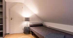 Postel nebo postele na pokoji v ubytování Appartementanlage am Arnumer See