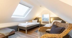 Postel nebo postele na pokoji v ubytování Appartementanlage am Arnumer See