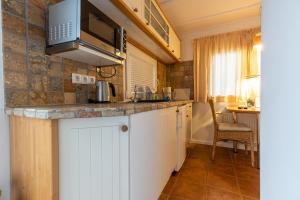 Kuchyň nebo kuchyňský kout v ubytování Appartementanlage am Arnumer See