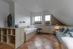 Postel nebo postele na pokoji v ubytování Appartementanlage am Arnumer See