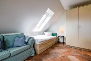 Postel nebo postele na pokoji v ubytování Appartementanlage am Arnumer See