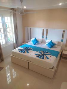 Säng eller sängar i ett rum på Hevana holidays