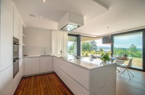 Cuisine ou kitchenette dans l'établissement Au bois du Sart-Tilman