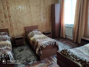 Cama o camas de una habitación en Частный дом