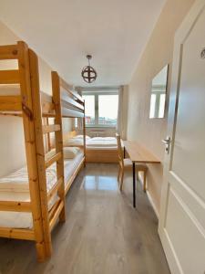 Postel nebo postele na pokoji v ubytování MAC City Hostel + 37 fotografií