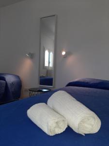 Ένα ή περισσότερα κρεβάτια σε δωμάτιο στο Holiday Home Sciacca