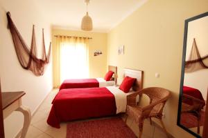 Cama o camas de una habitación en Casa a Sul - Lagos Guesthouses