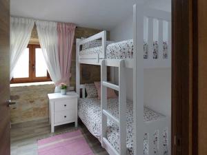 Postel nebo postele na pokoji v ubytování CASA VEIGA