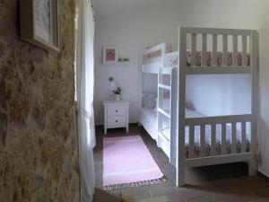 Postel nebo postele na pokoji v ubytování CASA VEIGA
