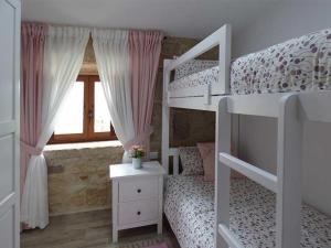 Postel nebo postele na pokoji v ubytování CASA VEIGA