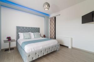 Posteľ alebo postele v izbe v ubytovaní Grande Amore Villa