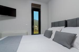 Posteľ alebo postele v izbe v ubytovaní Grande Amore Villa