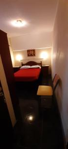 En eller flere senge i et værelse på Pescadores Departamentos