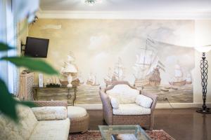 Χώρος καθιστικού στο Hotel Capanna d'Oro Dependance