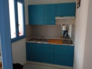 Een keuken of kitchenette bij La Halte