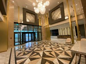 TV a/nebo společenská místnost v ubytování Limak Skopje Luxury Hotel