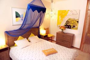 A bed or beds in a room at Holidays in Tarajalejo - home office with sea view Még 11 kép