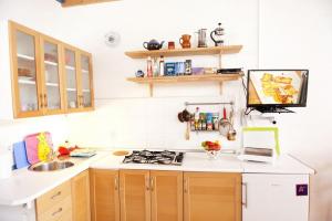 A kitchen or kitchenette at Holidays in Tarajalejo - home office with sea view