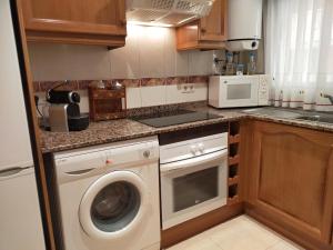 Kuchyň nebo kuchyňský kout v ubytování ACV- Acapulco III Planta 1 Norte