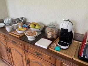 a counter with a mixer and bowls of food on it at Hotel San Marcus in Porta