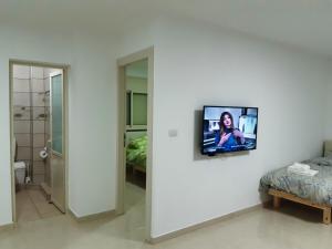 TV a/nebo společenská místnost v ubytování OPEN SKY