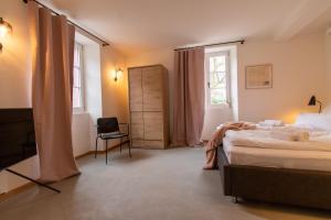 เตียงในห้องที่ Ferienhaus Martinshof +45 ภาพ
