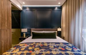 Voodi või voodid majutusasutuse Hotel Marquee Medellín toas