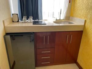 Kuchyň nebo kuchyňský kout v ubytování Departamentos K&B + 37 fotografií