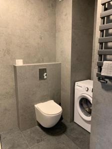 Kúpeľňa v ubytovaní Apartamenty Wola Goleszowska + 20 fotografií
