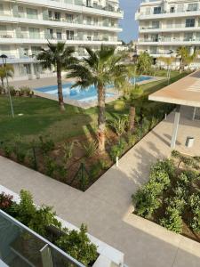 Bazén v ubytovaní Apartamento playa y club náutico a 150m alebo v jeho blízkosti