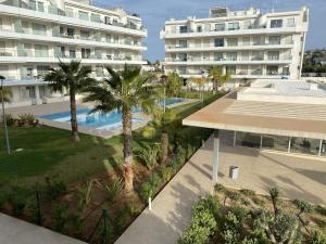 Bazén v ubytovaní Apartamento playa y club náutico a 150m alebo v jeho blízkosti