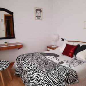 Posteľ alebo postele v izbe v ubytovaní Hostal "Los Chanos el Ruso"