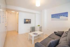 A television and/or entertainment centre at Candelario apartamentos