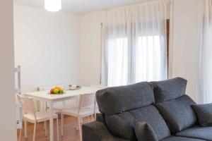 A seating area at Candelario apartamentos