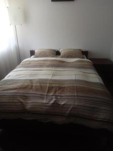Posteľ alebo postele v izbe v ubytovaní APARTAMENT LUCYNA + 5 fotografií