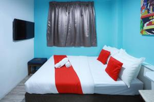 Llit o llits en una habitació de Hotel Aman- Nilai & KLIA
