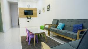 Μια τηλεόραση ή/και κέντρο ψυχαγωγίας στο NikQi's Homestay Temerloh