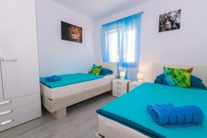 Łóżko lub łóżka w pokoju w obiekcie House Green